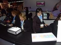 Receptionists Working Philips Booth